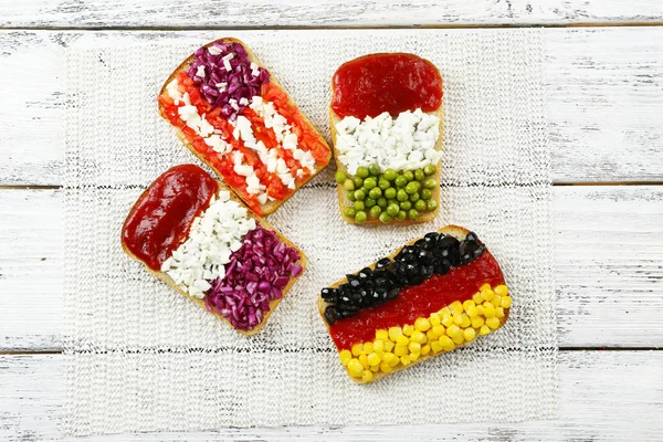 Sandwiches with different flags — Stock Photo, Image