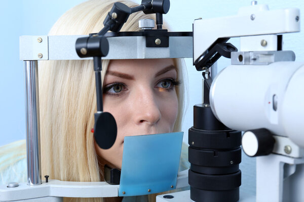 Woman having her eyes examined