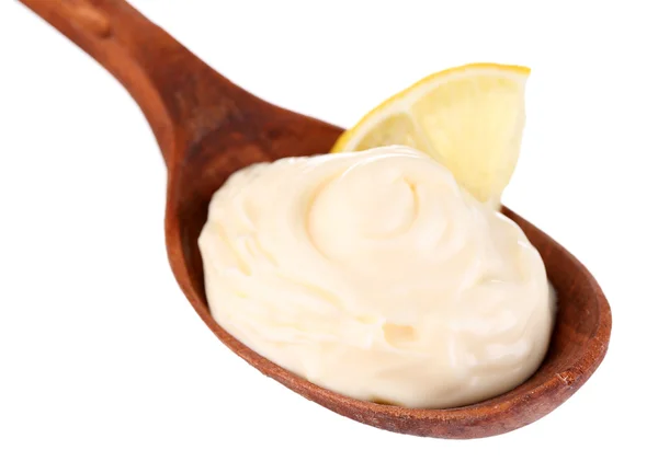 Mayonnaise in wooden spoon — Stock Photo, Image