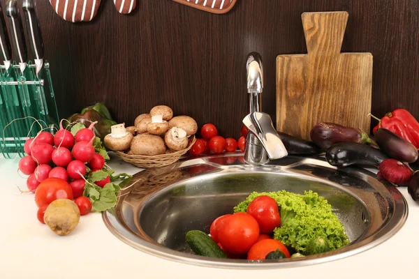 Fresh vegetables in sink — Stock Photo, Image