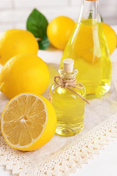 Lemon oil on table close-up — Stock Photo, Image