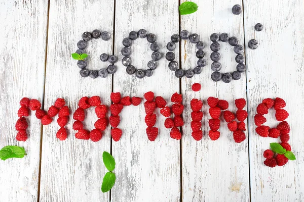 Words with blueberries and raspberries — Stock Photo, Image