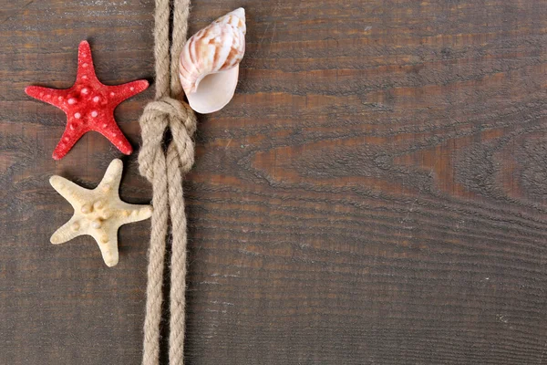 Marine Knoten auf Holz Hintergrund — Stockfoto