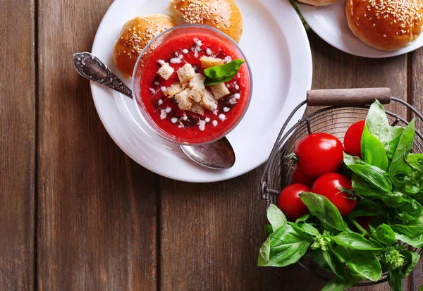 Gazpacho soup in glass bowl, on color wooden background — Stock Photo, Image
