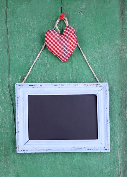 Rectangular chalkboard on wooden background — Stock Photo, Image