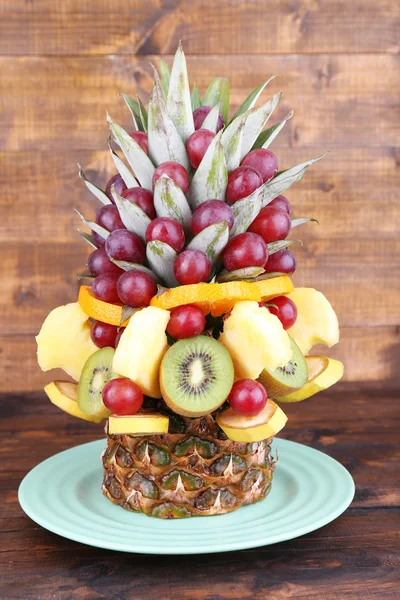 Table decoration made of fruits on brown wooden background — Stock Photo, Image