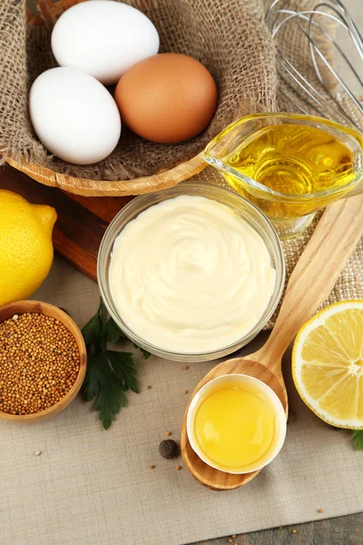 Mayonnaise ingredients on wooden background — Stock Photo, Image