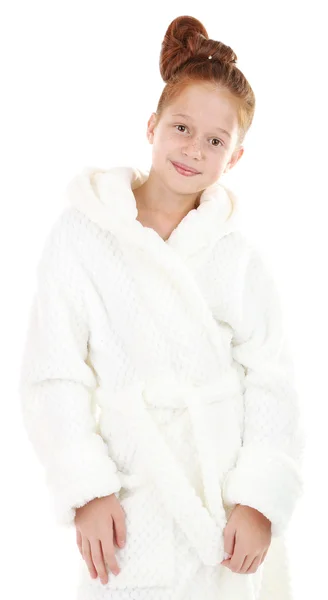 Красивая маленькая девочка в халате изолирована на белом — стоковое фото