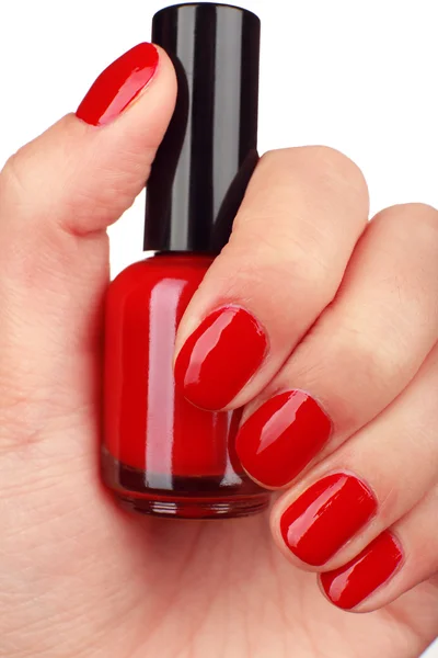 Nail polish in hand — Stock Photo, Image