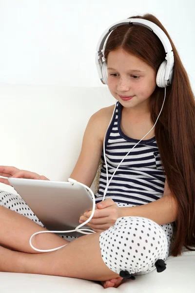 Little girl with laptop — Stock Photo, Image