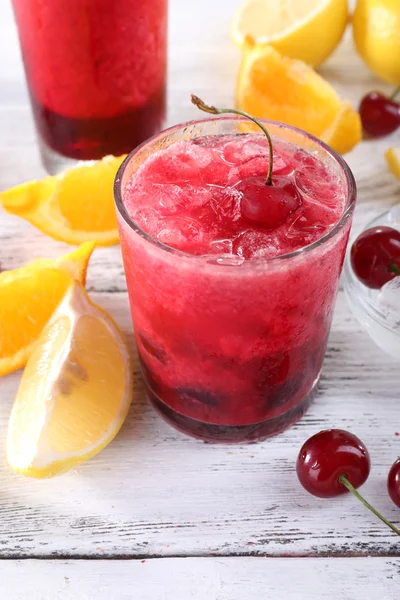 Fresh cold cherry cocktail with mint, ice and lemon — Stock Photo, Image