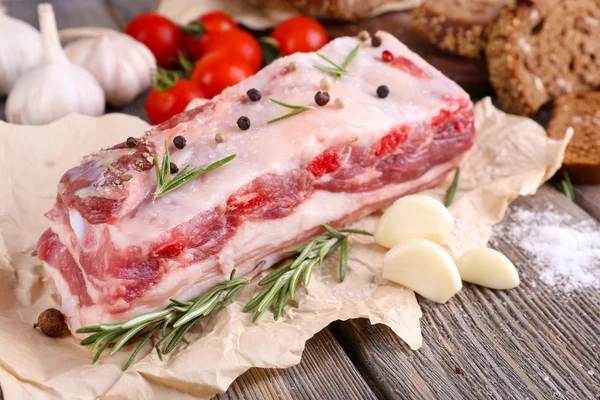 Bacon with bread and spices — Stock Photo, Image