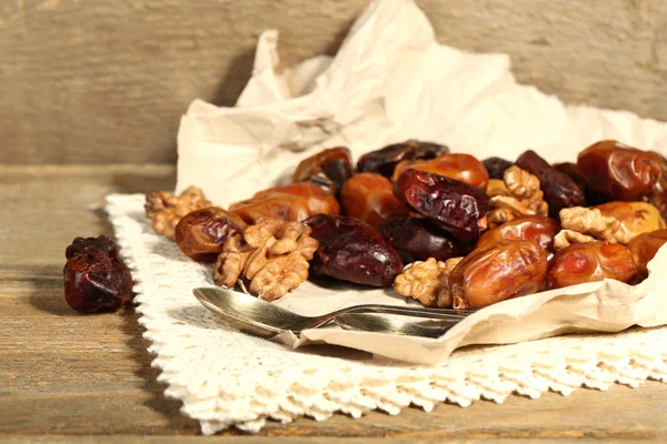Tasty dates fruits on wooden table — Stock Photo, Image
