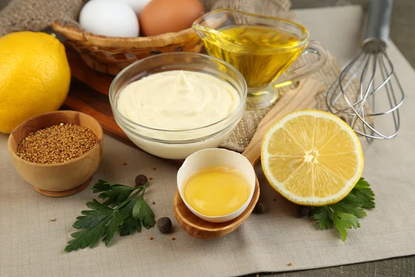 Mayonnaise ingredients on wooden background — Stock Photo, Image