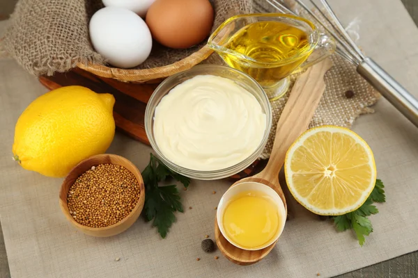 Mayonnaise ingredients on wooden background — Stock Photo, Image