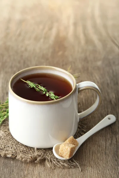 Cup of tasty herbal tea — Stock Photo, Image