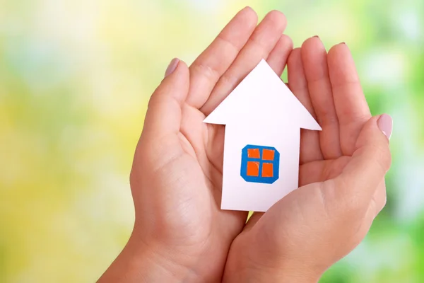 Hands holding paper house — Stock Photo, Image