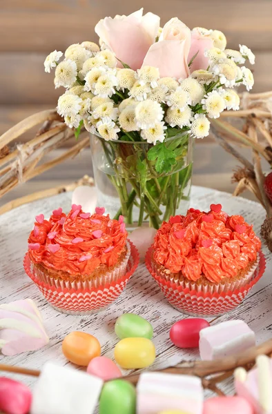 Tasty cupcakes on table — Stock Photo, Image