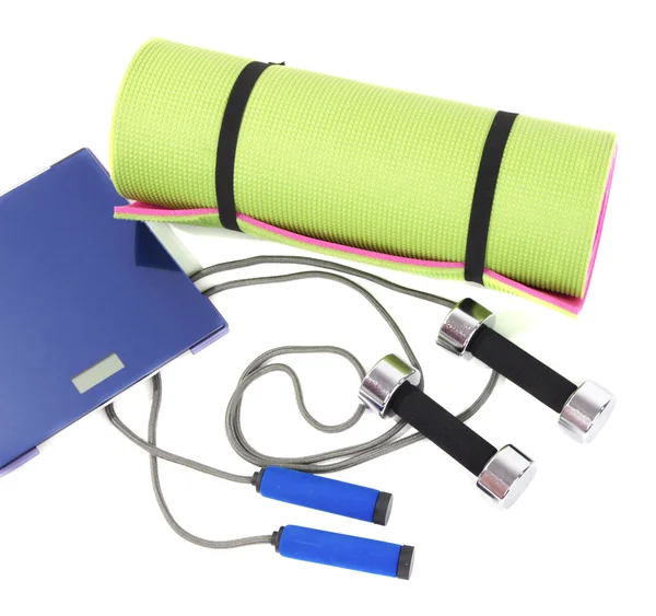 Sports requisites on sport mat — Stock Photo, Image