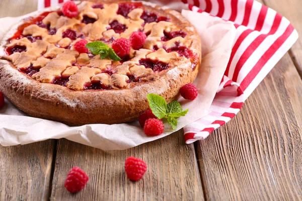 Tasty cake with berries on table close-up — Stock Photo, Image