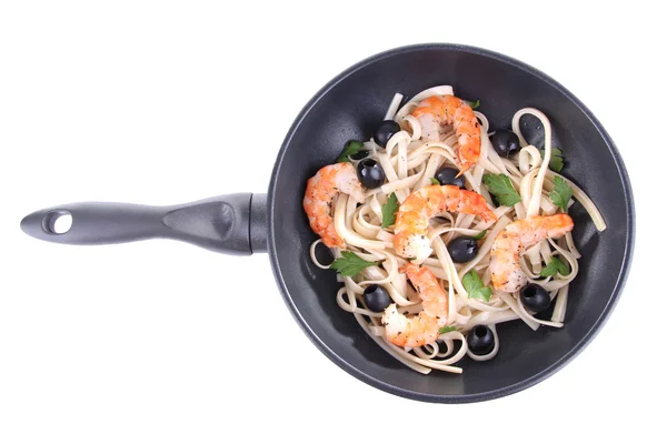 Fresh prawns with spaghetti and vegetables in a pan on white background isolated — Stock Photo, Image