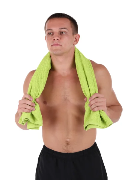 Bonito jovem desportista segurando toalha isolada no branco — Fotografia de Stock