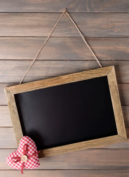 Vintage frame on wooden background — Stock Photo, Image