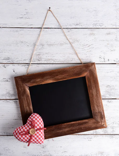 Vintage frame on wooden background — Stock Photo, Image