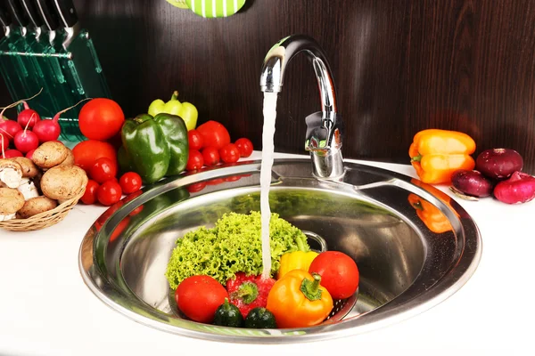 Fresh vegetables in sink — Stock Photo, Image