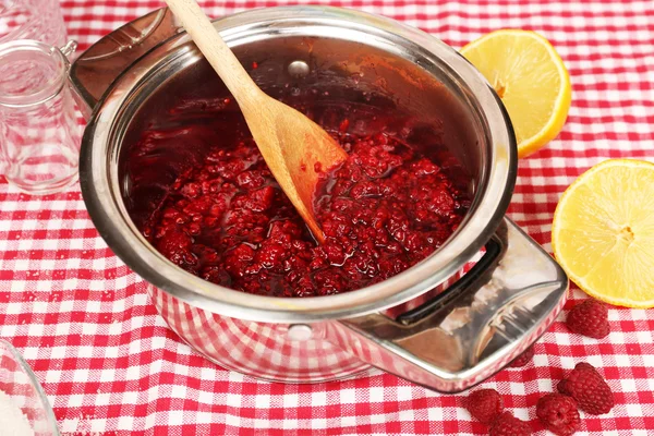 Red raspberries in metal pan — Stock Photo, Image