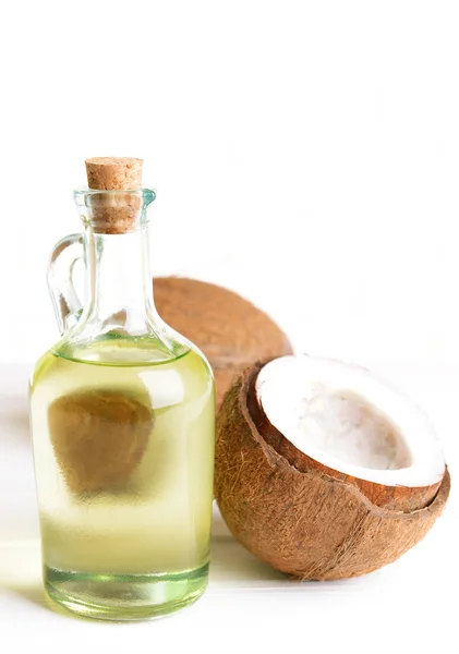 Olej kokosowy na stole — Zdjęcie stockowe