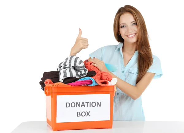 Girl volunteer with donation box — Stock Photo, Image