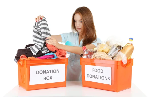 Meisje vrijwilliger met donatie box — Stockfoto