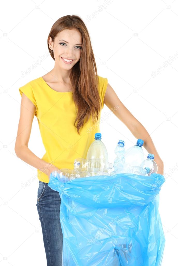 Girl sorting plastic bottles