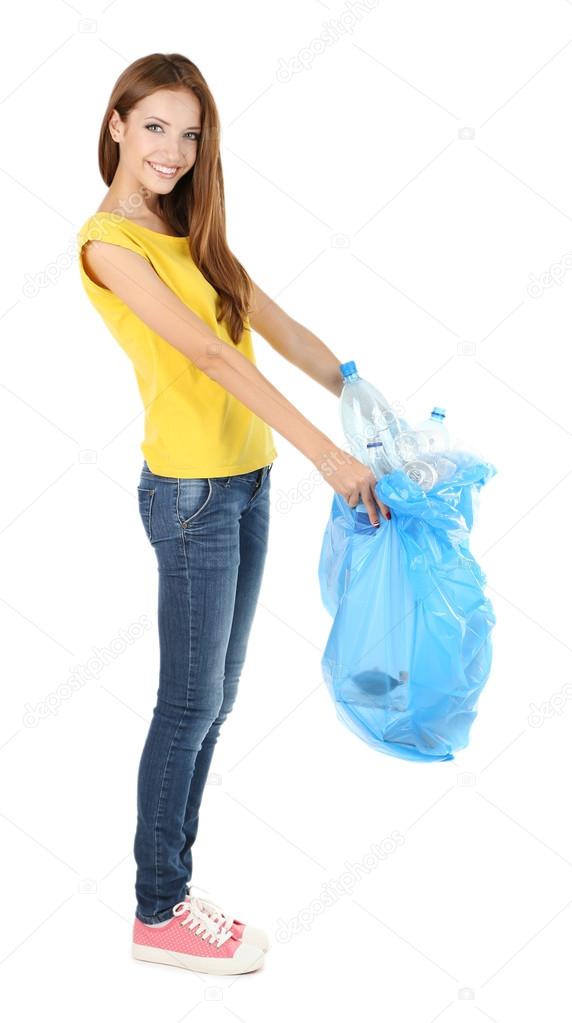 Girl sorting plastic bottles