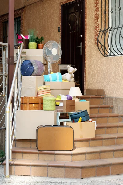 Moving boxes on stairs — Stock Photo, Image