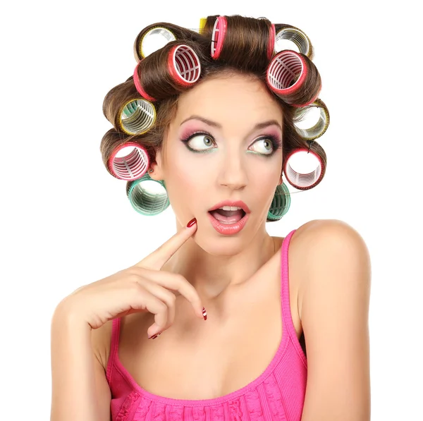 Menina bonita em encrespadores de cabelo isolado no branco — Fotografia de Stock