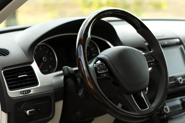 Modern car interior. Steering wheel, close-up — Stock Photo, Image