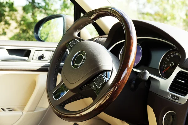 Modern car interior. Steering wheel, close-up — Stock Photo, Image