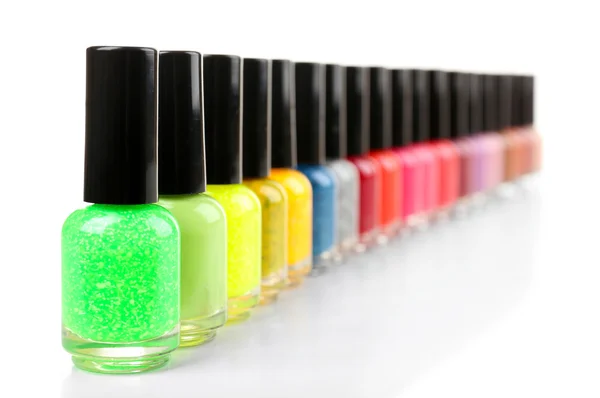 Colorful nail polishes isolated on white — Stock Photo, Image