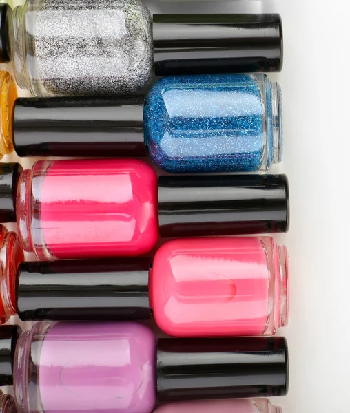 Colorful nail polishes, isolated on white — Stock Photo, Image