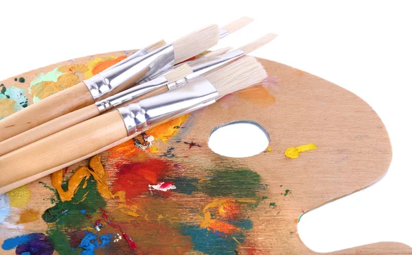 Paint brushes and palette — Stock Photo, Image