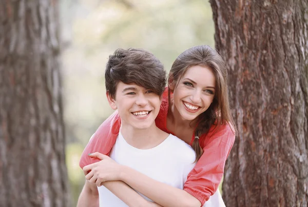 Beautiful young couple in park — Stock Photo, Image