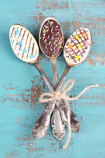 Spoons with tasty chocolate — Stock Photo, Image