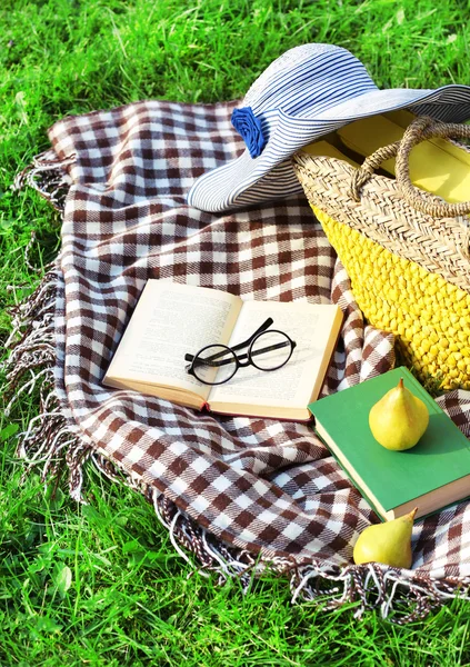 Books, pears. bag and hat — Stock Photo, Image