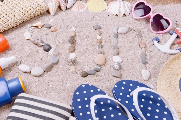 Arena con accesorios de playa —  Fotos de Stock