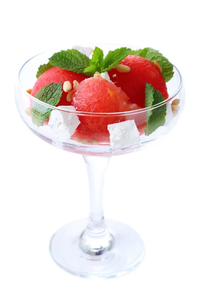 Salad with watermelon, feta and mint leaves in cocktail glass, isolated on white — Stock Photo, Image