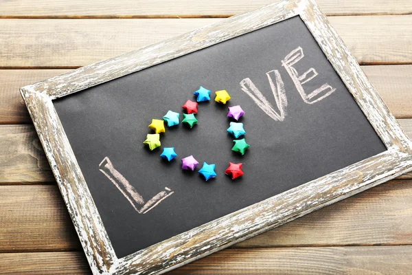 Liefde geschreven op schoolbord — Stockfoto