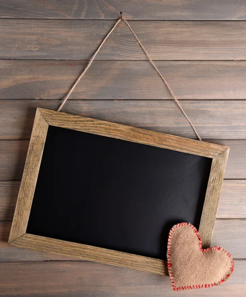 Vintage frame on wooden background — Stock Photo, Image