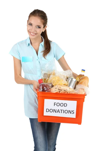 Voluntário menina com caixa de doação com alimentos isolados em branco — Fotografia de Stock